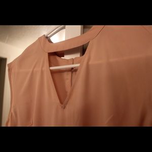 Extra small short sleeved light pink blouse